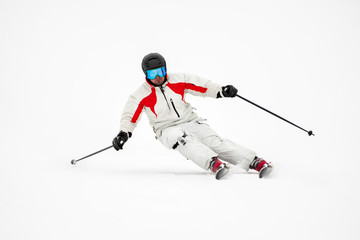 Skier on piste in mountains