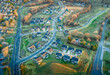 Aerial view of new construction single family home neighborhood with grand houses in Maryland real estate development