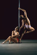 © fisher05 - the girl is engaged in gymnastic exercises at the pylon