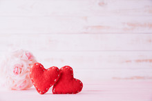 Valentines Day And Love Concept. Two Red Hearts With Pink Rose Flower On White Wooden Background.