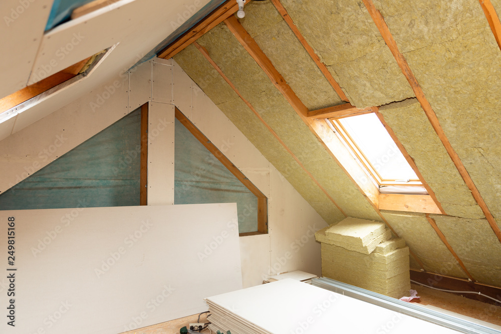 House attic insulation and renovation. Drywall construction - obrazy, fototapety, plakaty 
