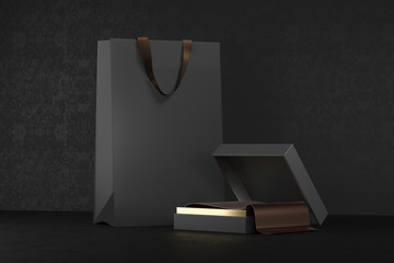 Premium black package for purchases on a black background. Black paper shopping bag with handles Mock Up. Luxury bag and box, 3d rendering.