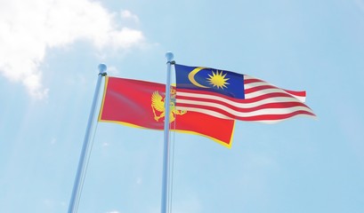 Malaysia and Montenegro, two flags waving against blue sky. 3d image