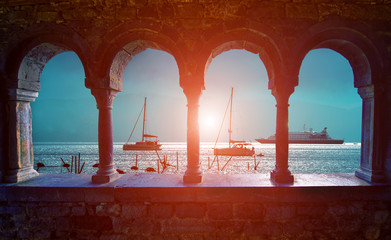 Wall Mural - magical sea view through the castle and gothic church of st. peter arches in porto venere, liguria, 
