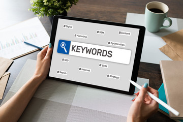 Wall Mural - Keywords. SEO, Search engine optimization and internet marketing concept on screen.