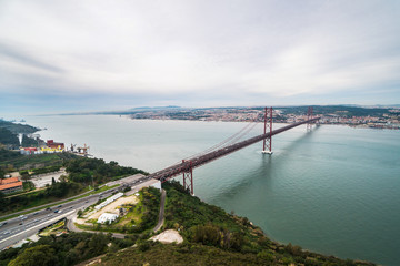 Panoramic view of Ponte 25 de Abril, long bridge in Lisbon, Portugal