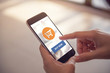 © oatawa - Online payment. Hands of woman using mobile smartphone for online shopping.