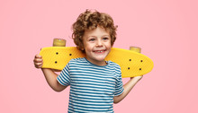 Cheerful Boy With Skateboard