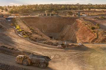 Wall Mural - Truck laden with ore leaving a mine tunnel at a copper mine in NSW, Australia