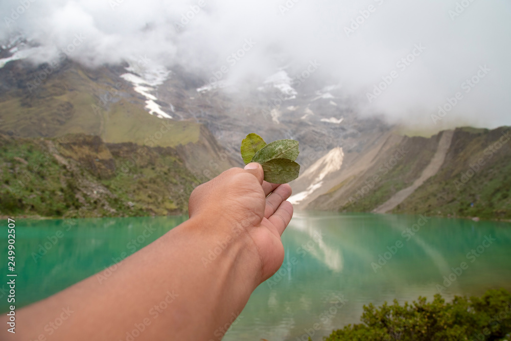 ritual of coca to the pachamama in humantay lake in Peru on Salcantay ...