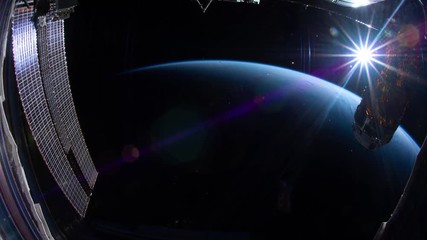 Wall Mural - Earth as seen through window of International Space Station ISS . Elements of this image furnished by NASA.