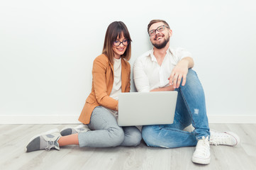 Wall Mural - Two freelancers working at office