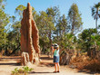photographing aa tourist photographs a cathedral termite mound in the northern territory termite mound