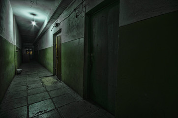 Dark corridor. Mystical interior of dark empty corridor, tunnel in an abandoned house. Dark mysterious corridor. The interior of an abandoned house, road to hell.