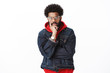 © Cookie Studio - Serious-looking throughtful good-looking african-american hip-hop dancer with beard in glasses and denim jacket over hoodie touchign face with finger as leaning on hand, listening and thinking