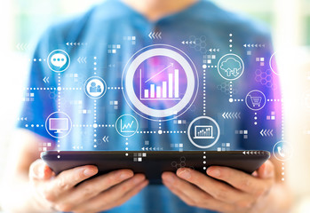 Poster - Marketing concept with young man using a tablet computer