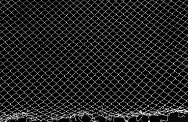 Wall Mural - damage wire mesh on black background