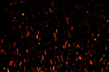 Wall Mural - Fire particles isolated on black background overlay. Put it over your image in screen mode.