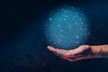 Poster - Human hand holding sphere social connection technologies. Mixed media.