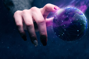Poster - Woman touching planet with finger and network web and purple nebula dust. Mixed media.