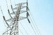 © Nuttapon - High voltage electricity pylon for electric supply transmission with blue sky, Power distribution technology and generator infracstructure equipment