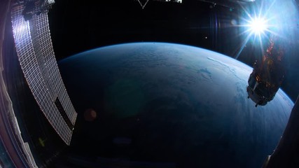 Wall Mural - Earth as seen through window of International Space Station ISS . Elements of this image furnished by NASA. ISS057