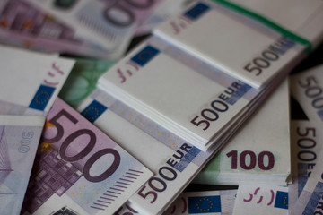 Euro cash. Many Euro banknotes of different values. Euro cash background.