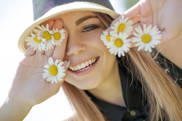 Wall Mural - Woman with daisies 