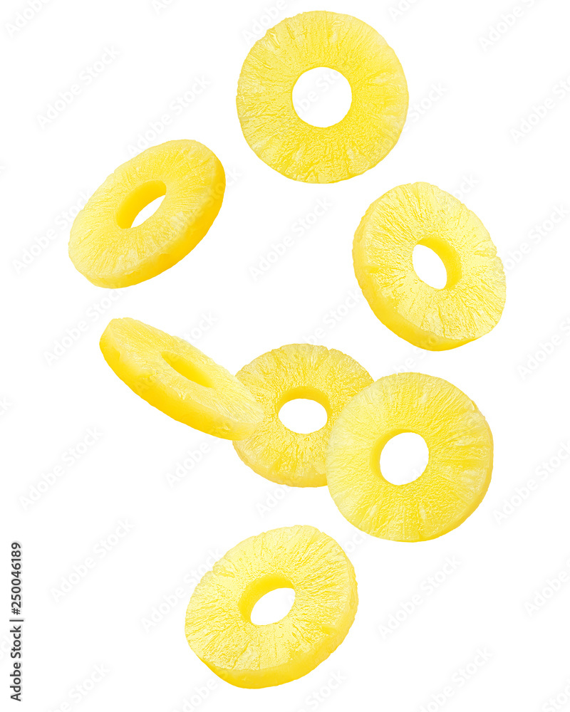 Falling pineapple slice, ring, isolated on white background, clipping path, full depth of field - obrazy, fototapety, plakaty 