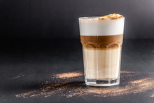 A Modern, Lactose-free Latte Or Cappuccino Coffee With Almond Milk. Above The Fire Sugar Burned Sugar. Caramel Crust. Drink In A Glass Tumbler. Copy Space