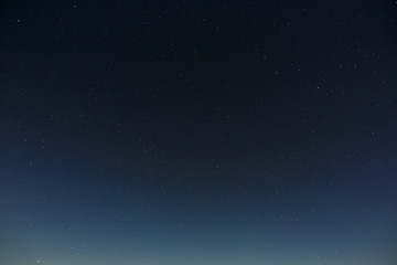 stars in the night sky. outer space background with the full moon photographed.