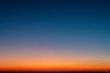 canvas print picture - Sky gradient from blue to orange sunset