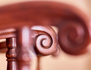 classic furniture detail, walnut wood spiral shaped armchair