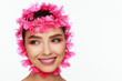 © Andriy Goncharenko - Portrait of an energetic laughing beautiful woman with a pink wreath on her head