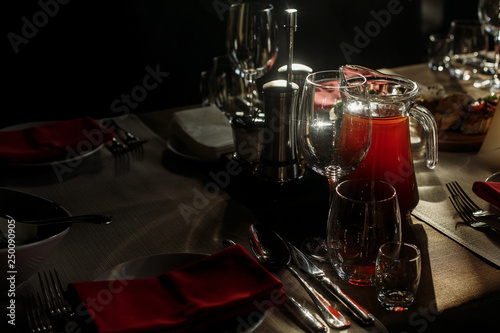 Luxury Wine Glasses And Silver Tableware Near Plates With Red