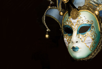 Carnival venetian mask on black background