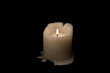 © Vadym - Candle on black background. Horizontal image