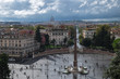 The panoramic vie of Piazza del Popolo shot from above - Terazza del Pincio. The Cupola of San Pietro Cathedral is visible in the distance.