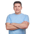 Portrait handsome man wearing blue informal t-shirt with folded arms isolated