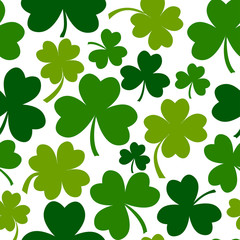 Green seamless pattern with four and tree leaf clovers for Saint Patrick's Day. Vector illustration