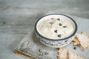 Homemade Cannoli dip with chips, selective focus