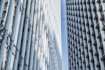 jet plane flying over architecture