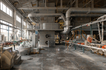 Long dusty corridors inside the ceramic factory