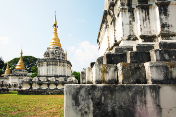 Wall Mural - Golden pagoda at Wat Prathat Lampang Luang temple located in Lampang Province, Thailand.