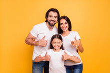 Portrait Of Nice Beautiful Winsome Cool Attractive Cheerful People Mom Dad Showing Thumbup Advert Recommend Isolated Over Shine Vivid Pastel Yellow Background