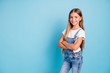 Portrait of her she nice-looking cute lovely attractive cheerful cheery straight-haired blonde girl folded arms copy space isolated on blue pastel background