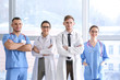 © Pixel-Shot - Team of young doctors in clinic