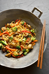 Wall Mural - Udon stir-fry noodles with vegetables in wok