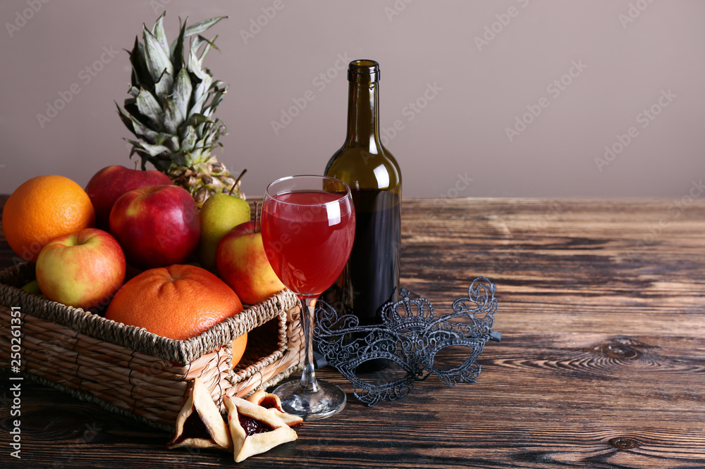 Gift basket for Purim holiday on table
