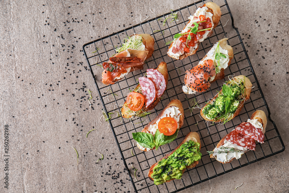 Fresh tasty bruschettas on cooling rack